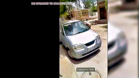 Rajasthani Suman Bhabhi in white outfit inside silver car, outdoor tease