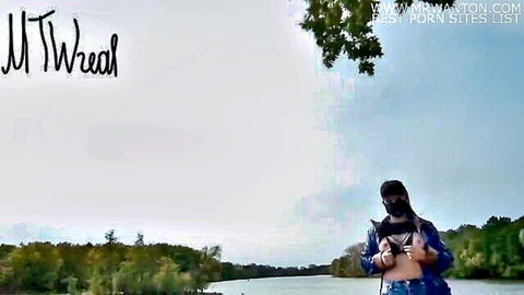 Hot MILF topless striptease by the lake, masked outdoor tease