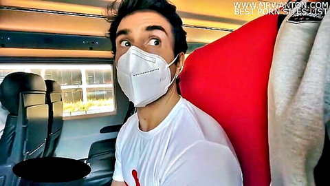 Excited man in white shirt and mask on train for public adventure, xHamster preview