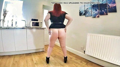 Curvy redhead big girl dances bottomless in kitchen, phat ass view