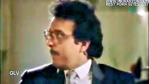 Handsome mustached man in glasses and suit smirking sideways in straight Indian porn thumbnail