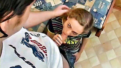 Russian teen girl giving intense blowjob to man in amateur video