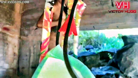 Amateur Latina girlfriend striptease under bridge with colorful scarves