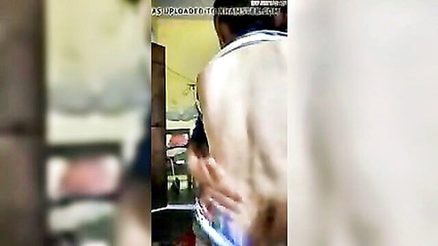 Indian couple in intimate rear embrace, amateur homemade scene