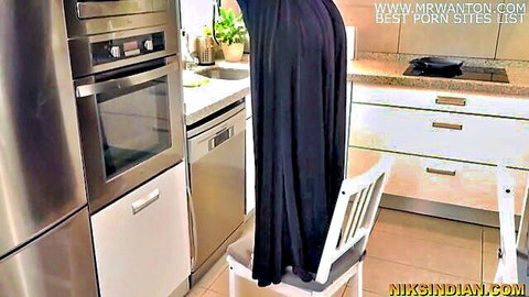Razia Bhabhi in black abaya teasing in kitchen on Dussehra