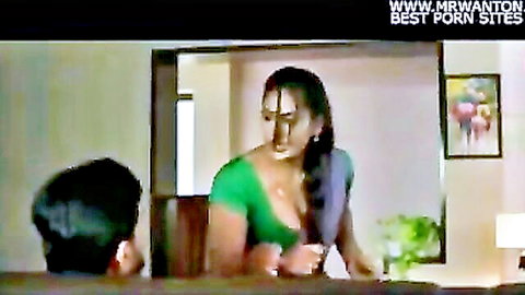 Busty Indian wife in tight green saree blouse seducing man from behind