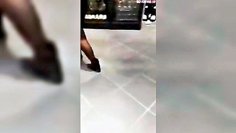Blurry black MILF bends over in liquor store with legs spread teasing rough public fuck