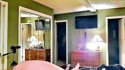 Curvy MILF wife bends over exposing big round ass cheeks with black panties pulled down