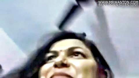 Close-up of sexy Indian woman looking up with open mouth ready to suck cock