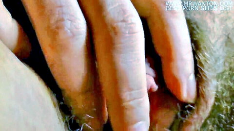 Close-up of sexy big clit being spread by hands in HD porn video