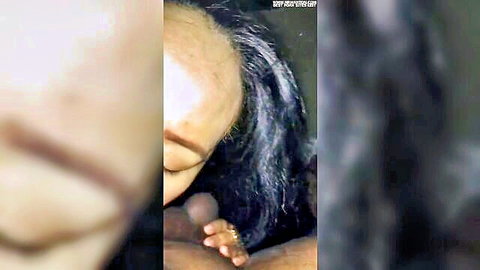 Blurry close-up of ebony woman with long dark hair and intimate hand touch