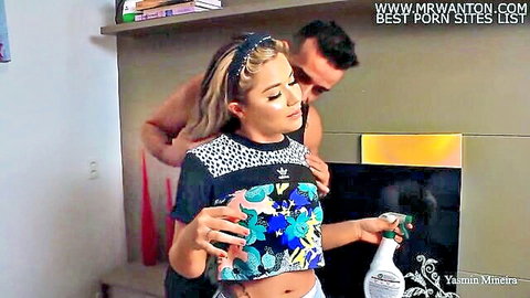 Yasmin Mineira as sexy maid hugs boss from behind in teasing embrace