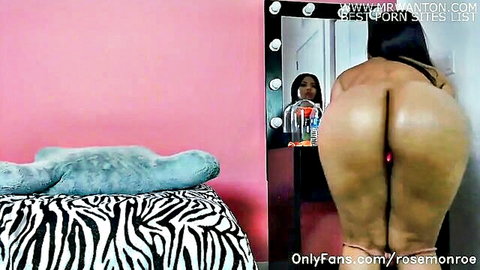 Thick ebony with massive ass bends over showing shaved pussy and tight asshole in webcam mirror view