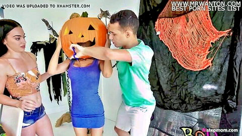 Stepmom in tight blue dress with big tits grabs Halloween jack-o-lantern mask from stepson in green shirt
