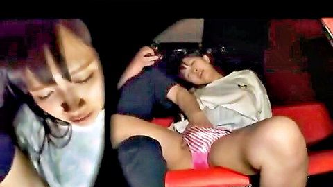 Japanese women lesbian play in car, one exposing pink panties legs spread