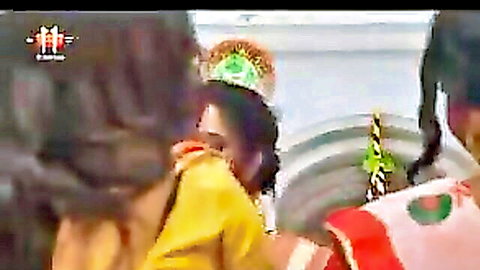 Indian women in sarees playing erotic Sindur Khela ritual, applying vermilion playfully