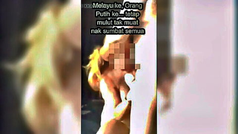 Blonde white woman enjoys big Malay cock in interracial scene