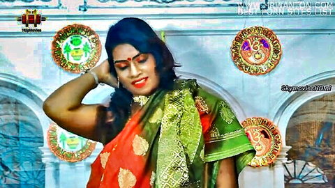 Indian aunty Mou seductively posing in green sari and blouse