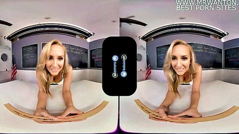Brett Rossi as naughty blonde teacher posing seductively in VR classroom