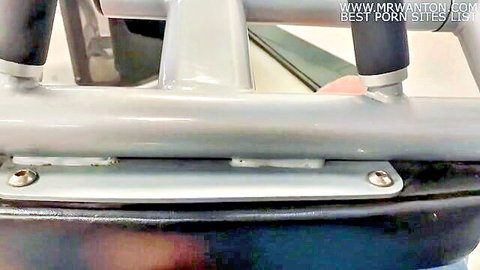 Close-up of black padded gym bench frame ready for rough gym sex