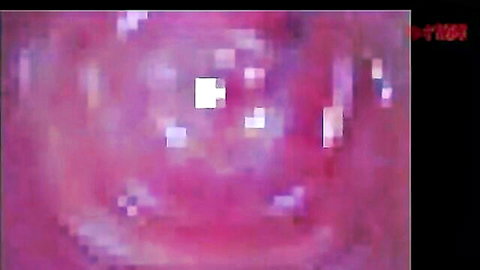 Blurry purple-tinted pixelated scene with Japanese '人妻' watermark and white abstract blobs