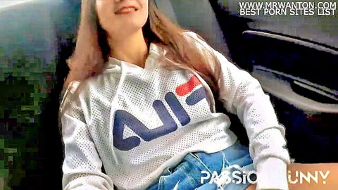 Hot brunette in Fila hoodie teases tight pussy in Uber taxi selfie