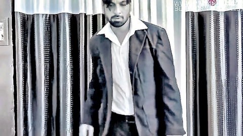 Bearded Indian man in open-collar suit for steamy office affair