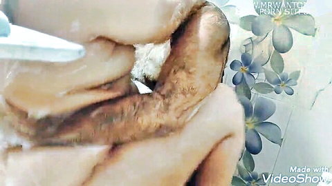 Big tits covered in thick cum dripping down as hand squeezes breast