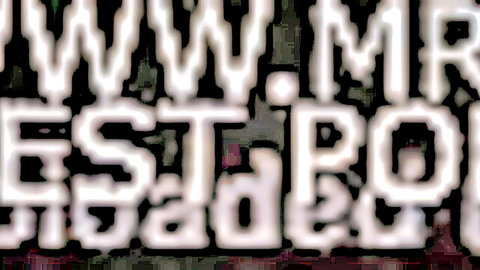 Blurry distorted www.mrtestbest.com logo text on black background no nudity