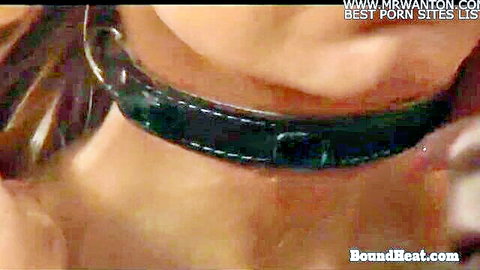 Lesbian slave in black leather collar awaits dominant mistress