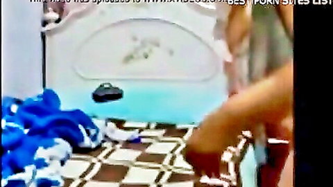 Asian woman bending over bathtub exposing ass in solo toy play