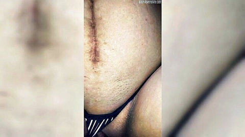 Katy exposes hairy pussy in striped panties close-up