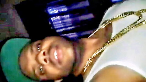 Flykeem da King in gold chains, intense upward gaze in amateur setup