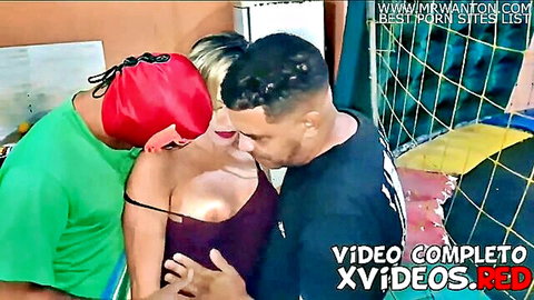 Blonde wife kissed by two men at party, exposed breasts in threesome tease