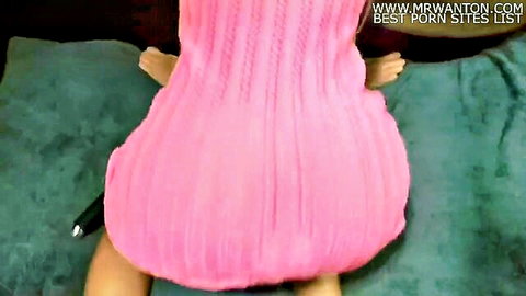 Asian girl in pink dress spreads legs from behind on bed POV tease