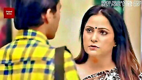 Hot Indian wife in tight saree stares intensely at husband during steamy romantic moment