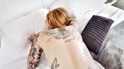 Tattooed blonde nude on bed, back view for hard fuck by Mark White