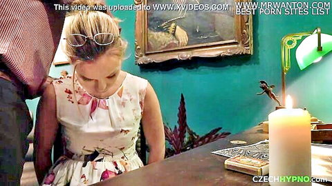 Blonde woman in floral dress sucks thick cock in vintage office blowjob
