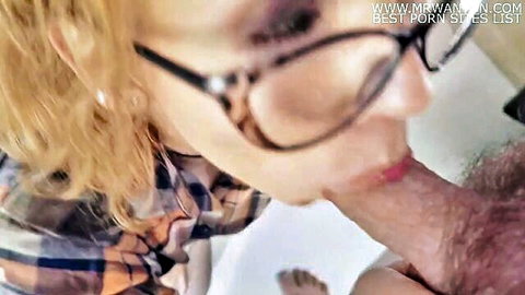 Blonde glasses girl in plaid shirt sucks hairy cock tip in closeup POV blowjob