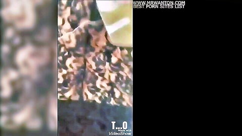 Teen in hijab bends over showing big ass in camo pants outdoors