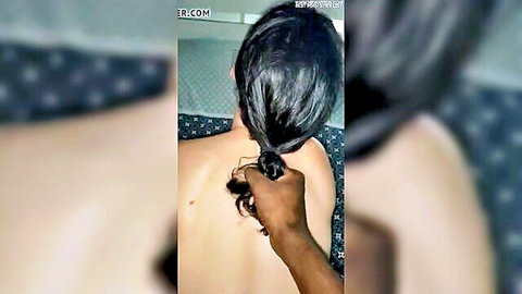 French woman with long black ponytail, nude back view, black hand pulling hair in interracial scene