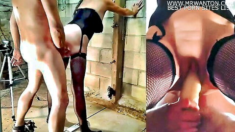 Woman in sexy black lingerie and stockings takes cock from behind against wall