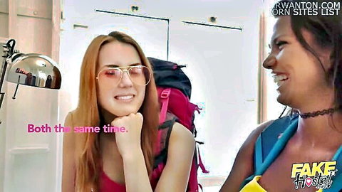 Chloe Lamour redhead with big boobs smiling with brunette friend in casual pose