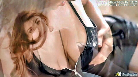 Curvy brunette in shiny black dress with deep cleavage downblouse tease