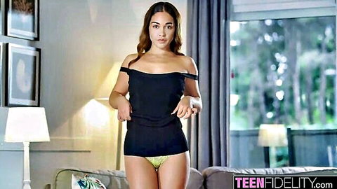 Ginebra Bellucci posing in black off-shoulder top and green panties