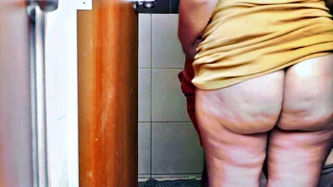 Curvy BBW exposing her massive bare ass in bathroom, inviting intense fuck