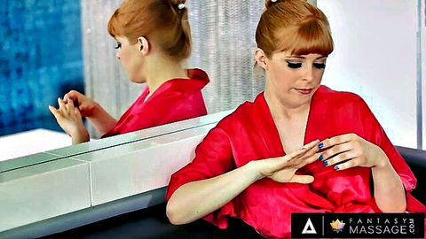 Busty redhead Penny Pax in open red robe teasing in mirror