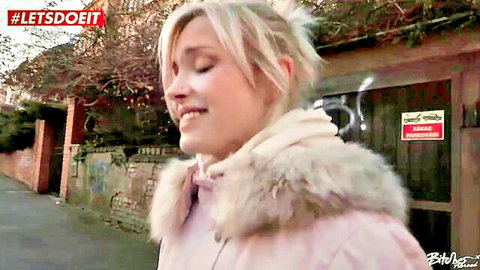 Hungarian babe Zazie Skymm smiling in pink fur coat outdoors