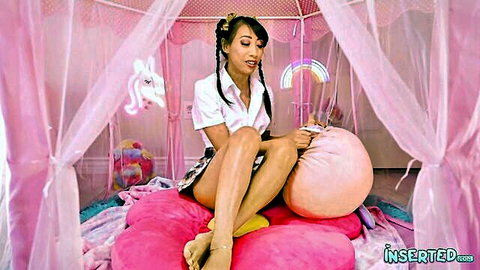 Salee Lee as cute Asian schoolgirl in white blouse and short skirt, pigtails