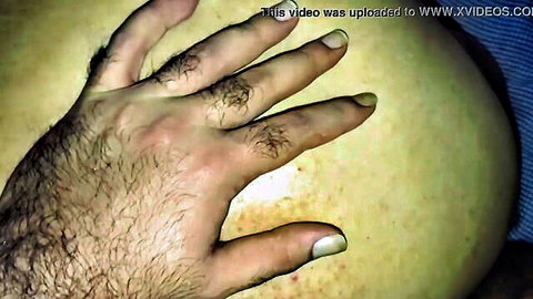 Hairy hand spreading huge pale ass cheeks exposing tight anus closeup